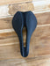 Selle Italia Model X Boost Superflow saddle, side profile showing the FeC steel rails and waved shape