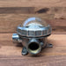 Reclaimed ship's bulkhead light showing mounting lugs and conduit entries
