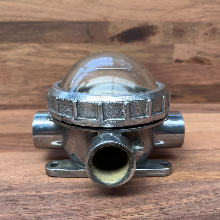 Low-profile salvaged marine bulkhead light, side view