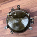 Salvaged round bulkhead light, additional view of iron housing