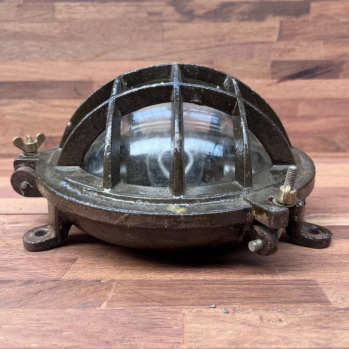 Salvaged round bulkhead light, alternate angle showing mounting