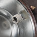 Close-up of original ceramic lamp holder inside vintage VEB steel ceiling light