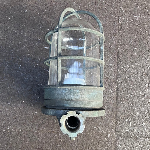Salvaged brass marine cage pendant light with clear glass dome, front view