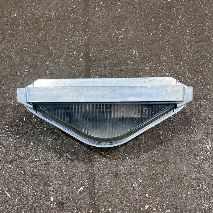 Inside the aluminium back box of a marine bulkhead light with ceramic lamp holder and fixing screws