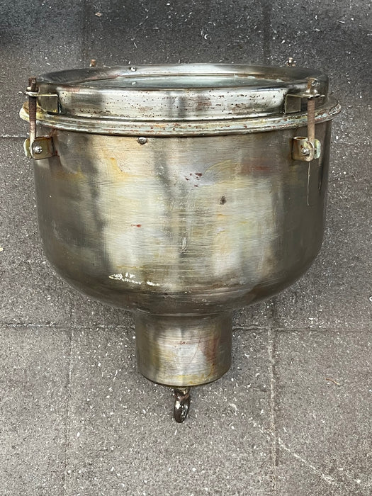 Salvaged polished spun steel pendant light shown from the side with glass front clamps