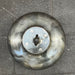 Salvaged spun steel pendant light viewed from above showing eye bolt and four-bolt top plate