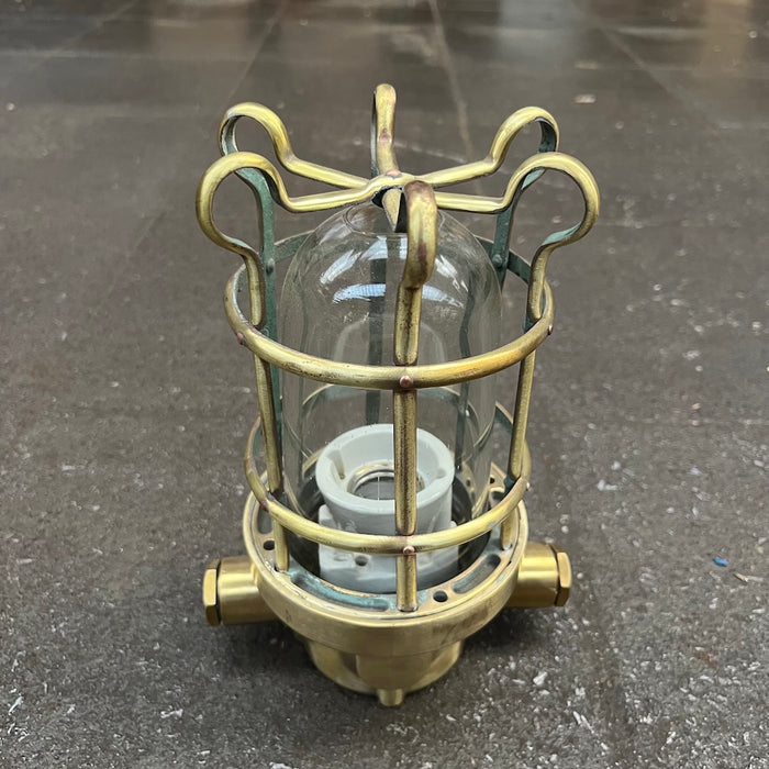 Salvaged Palazzoli solid brass passageway light with brass cage and clear glass dome