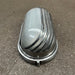Black oval aluminium bulkhead light with frosted glass and louvred guard