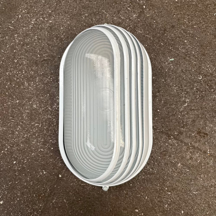 Oval aluminium bulkhead light with louvred guard, alternative view