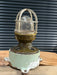 Vintage ship's bulkhead light with blue cast iron base, two cable glands and chrome cage