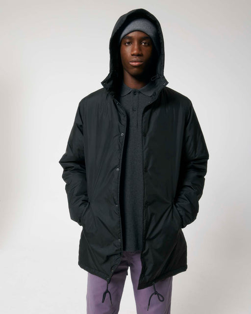Stanley/Stella SX204 unisex padded parka jacket in Black worn by model, front view