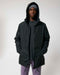 Stanley/Stella SX204 unisex padded parka jacket in Black worn by model, front view