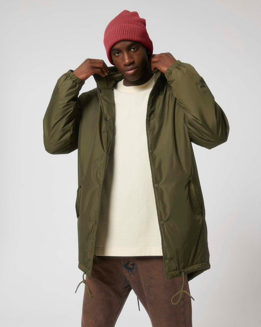 Stanley/Stella SX204 unisex padded parka jacket in British Khaki worn by model, front view