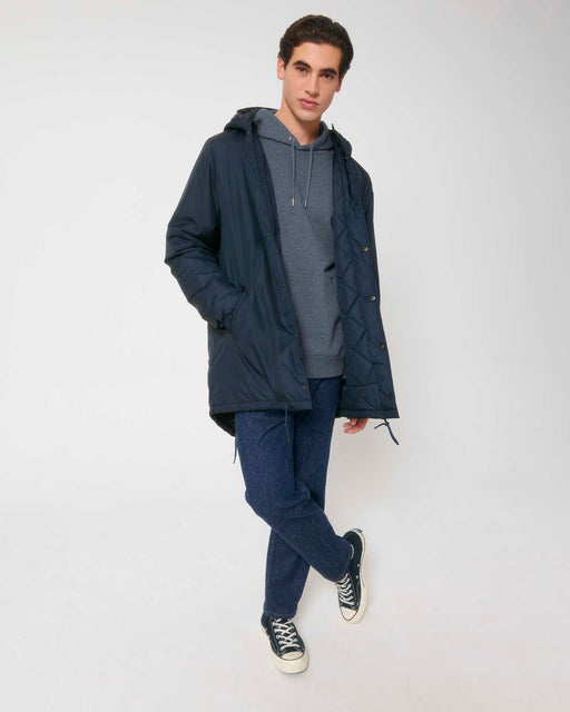 Stanley/Stella SX204 unisex padded parka jacket in French Navy worn by model, front view