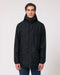 Stanley/Stella SX204 unisex padded parka jacket in Black, styled on model