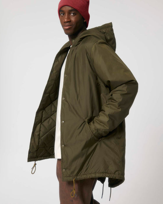 Stanley/Stella SX204 unisex padded parka jacket in British Khaki, side view on model
