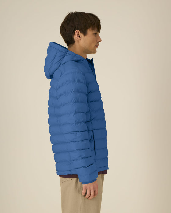 Stanley/Stella Stanley Voyager padded jacket in Mindful Blue, close-up on model