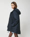 Stanley/Stella SX204 unisex padded parka jacket in French Navy, side view on model