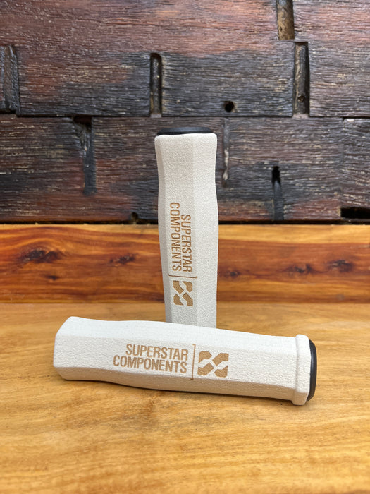 White and black Superstar Ultralight 43g foam slide-on bike grips